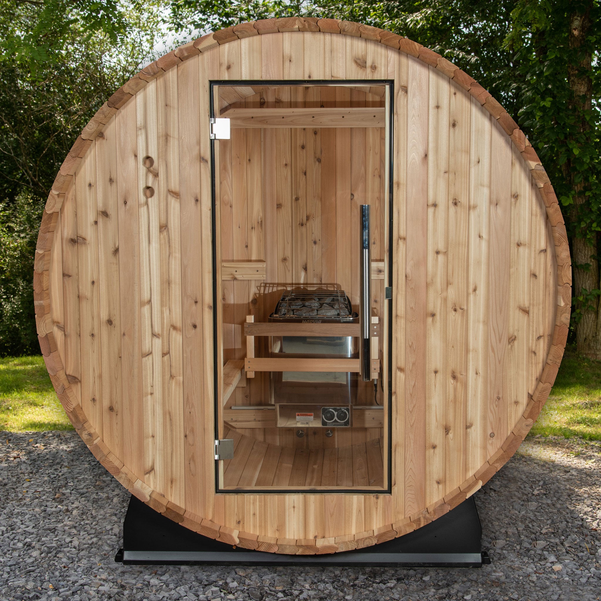 Classic Watoga Barrel sauna with glass door and stainless steel door handle.